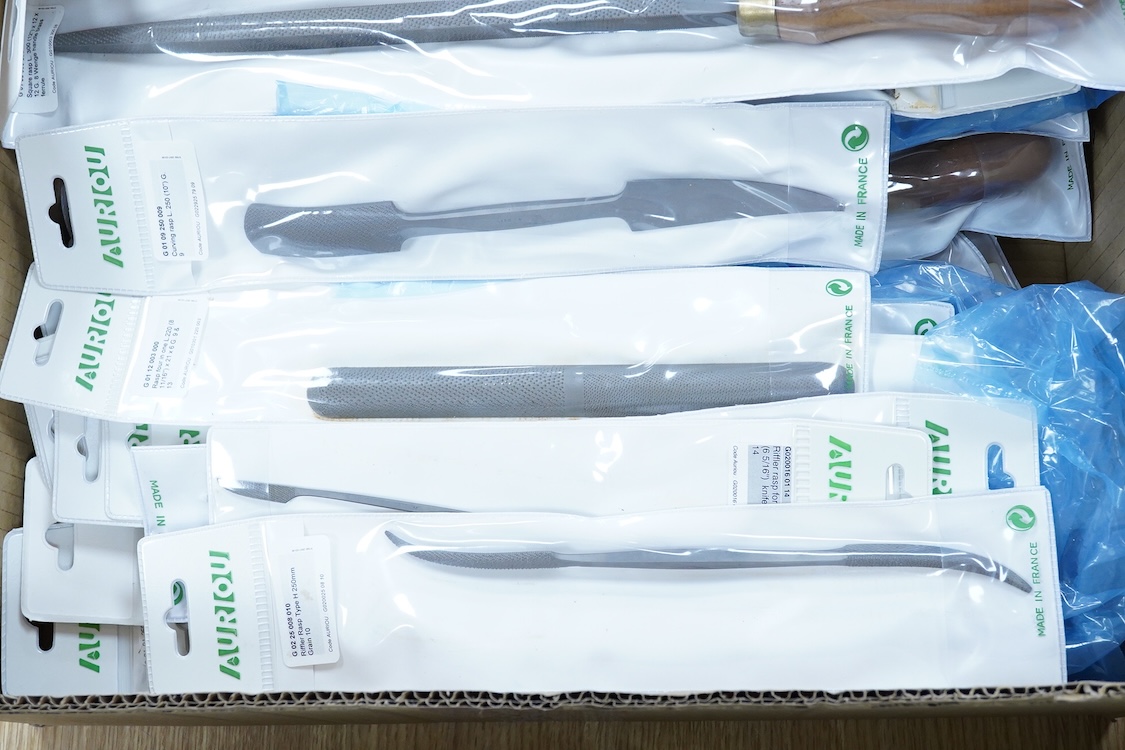 Thirty-three woodworking timber rasps by Auriou, including riffler rasps, taper rasps, square rasps, curved cabinet rasps, etc., all new in the original packets